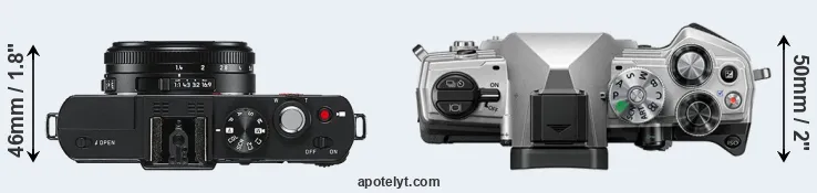 Compare D-LUX 6 versus OM-5 top