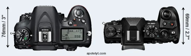 Compare D7100 versus E-M1 III top